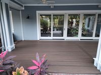 Weather-resistant composite deck by Tropical Roots Exteriors