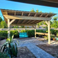 Sunlit pergola providing a stylish shade solution in Florida